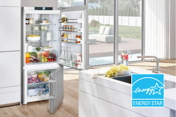 View of a refrigerator in a kitchen with the Energy Star label over it View of a refrigerator in a kitchen with the Energy Star label over it