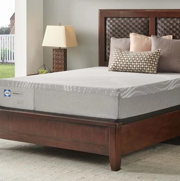 Credit: Sealy A Sealy mattress in a modern bedroom