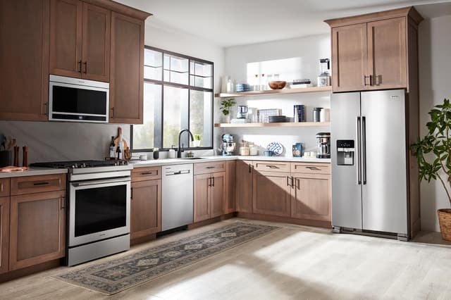 Front view of a modern kitchen with Maytag appliances Front view of a modern kitchen with Maytag appliances
