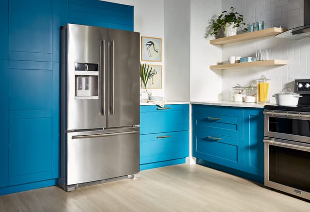 Front view of a modern kitchen with a Maytag refrigerator Front view of a modern kitchen with a Maytag refrigerator