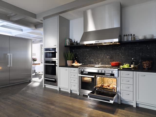 Front view of a modern kitchen with Miele appliances