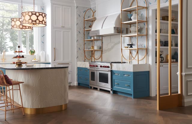 View of a modern kitchen with a wolf range and range hood